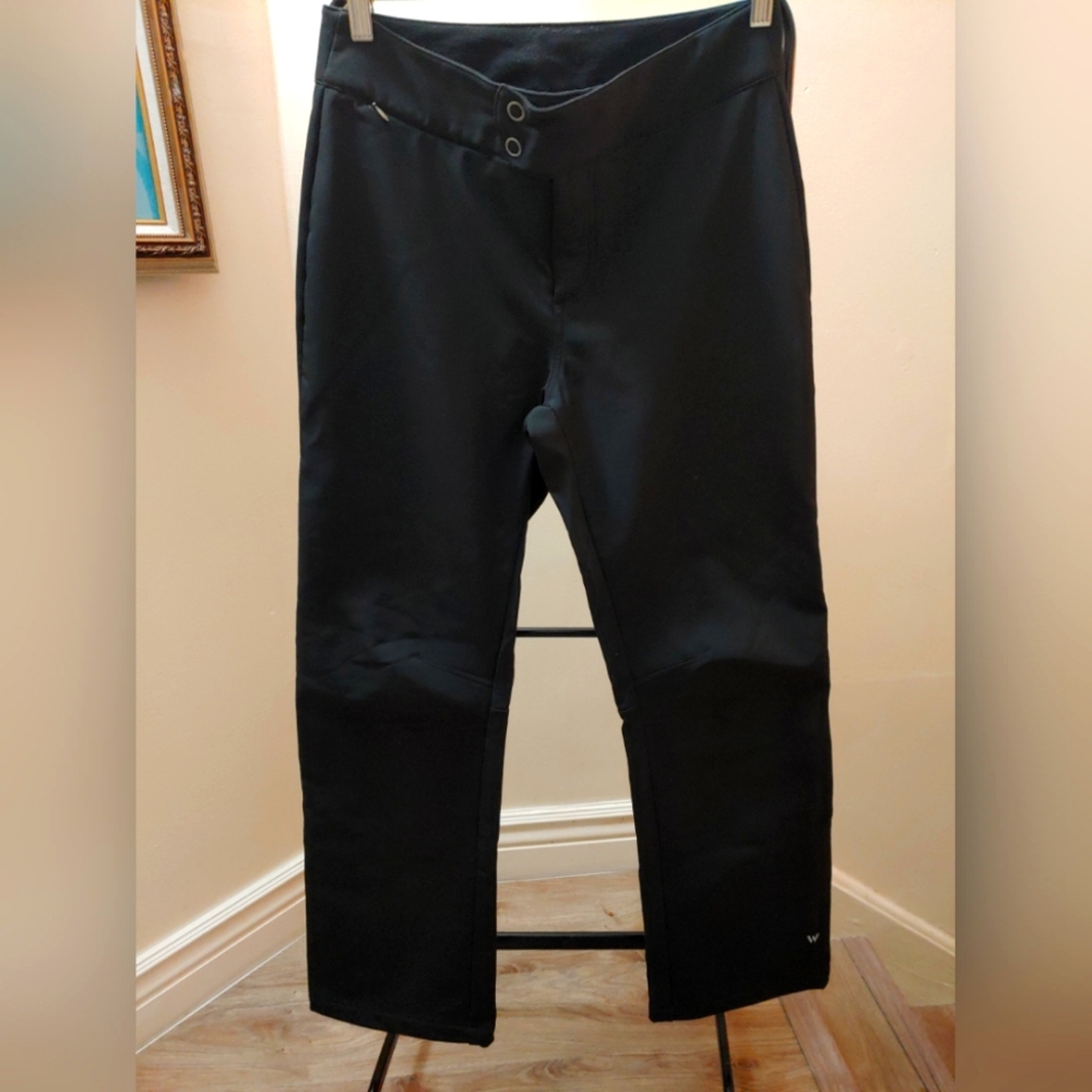 White Sierra women’s sz. sm. fleece lined black winter ski/snow pants. Inseam 31